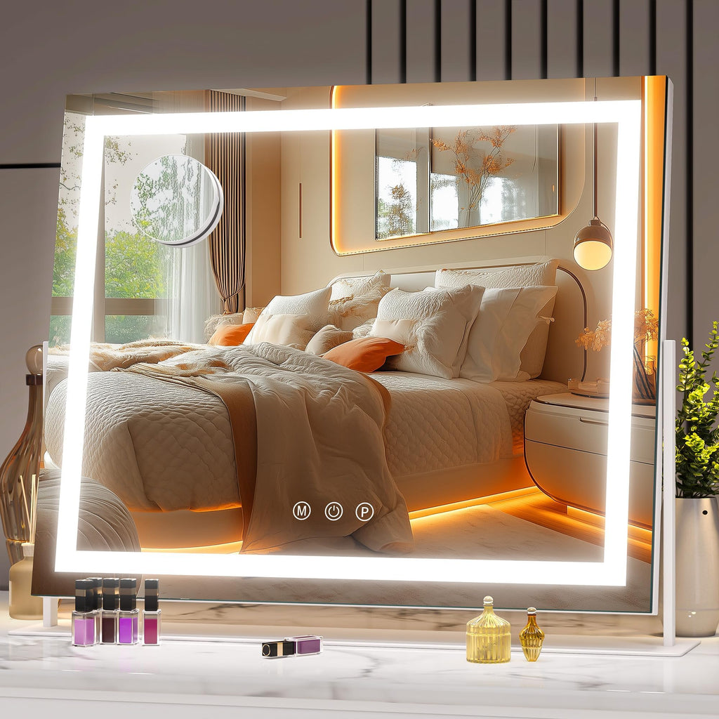Large illuminated mirror reflecting a bedroom with a bed and decor.